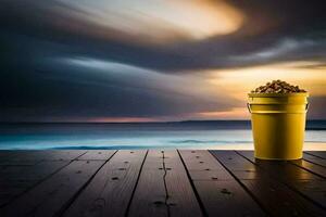 a bucket of popcorn on a wooden table in front of the ocean. AI-Generated photo