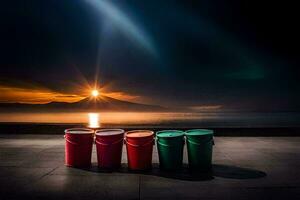 four red and green buckets sitting on the ground in front of the sun. AI-Generated photo