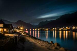 a night shot of a village by the water. AI-Generated photo