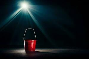 a red bucket on a dark floor with a spotlight shining on it. AI-Generated photo