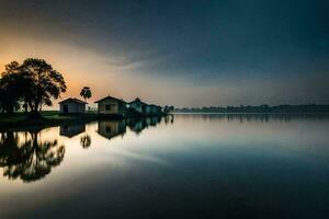 un lago con casas y arboles a puesta de sol. generado por ai foto