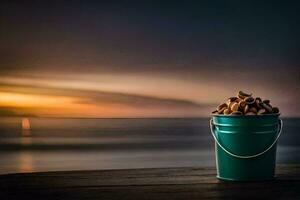 a bucket of nuts on a wooden table in front of the ocean. AI-Generated photo