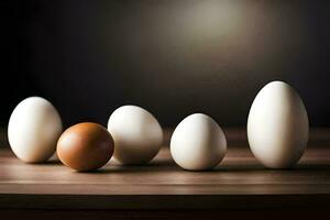 five eggs are lined up on a table. AI-Generated photo