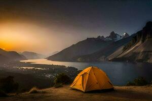 un amarillo tienda se sienta en el borde de un montaña con vista a un lago y montañas a puesta de sol. generado por ai foto