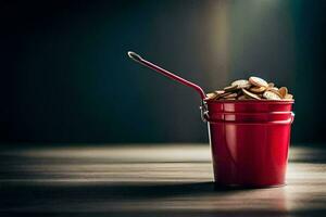 a red bucket filled with coins on a wooden table. AI-Generated photo