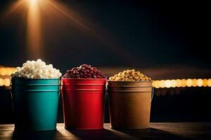 Tres cubos de palomitas de maiz en un mesa. generado por ai foto