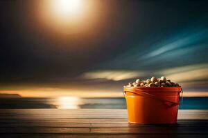 a bucket of nuts on a wooden table in front of the ocean. AI-Generated photo
