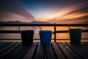 three buckets sit on a wooden deck overlooking the ocean. AI-Generated photo