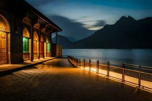 a walkway along the shore of lake como at night. AI-Generated photo