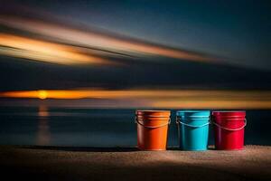 three buckets sit on the beach at sunset. AI-Generated photo