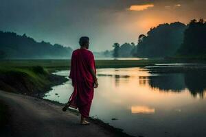 un monje caminando a lo largo un río a puesta de sol. generado por ai foto