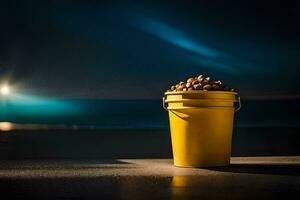 a bucket of nuts on the beach at night. AI-Generated photo