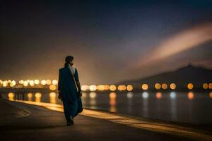 un mujer en un azul vestir camina a lo largo el playa a noche. generado por ai foto