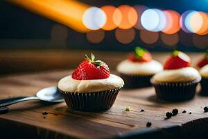 cupcakes with strawberries on a wooden table. AI-Generated photo