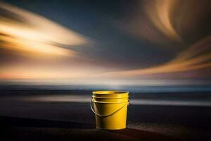 un amarillo Cubeta se sienta en el playa a puesta de sol. generado por ai foto