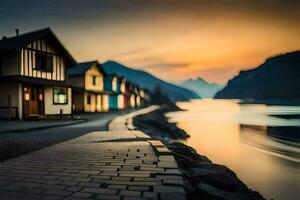a street with houses and a lake at sunset. AI-Generated photo