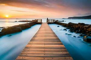 a wooden bridge leads to the ocean at sunset. AI-Generated photo