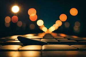 a close up of a keyboard on a table at night. AI-Generated photo