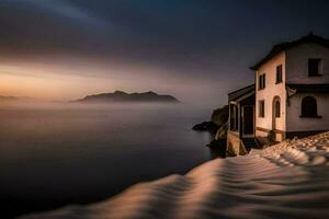 a house on the beach at sunset. AI-Generated photo