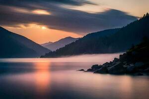 un hermosa puesta de sol terminado un lago con montañas en el antecedentes. generado por ai foto