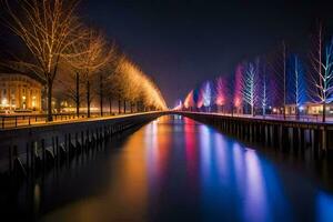 un largo puente con vistoso luces en eso a noche. generado por ai foto