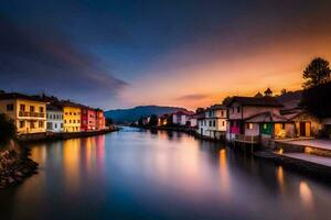 vistoso casas a lo largo el río a puesta de sol. generado por ai foto