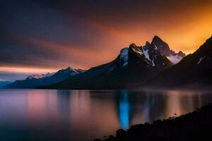 el montañas son reflejado en el agua a puesta de sol. generado por ai foto