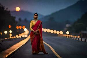 un mujer en un rojo sari en pie en el la carretera a noche. generado por ai foto