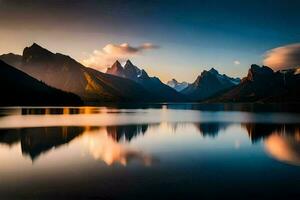 el montañas son reflejado en el agua a puesta de sol. generado por ai foto