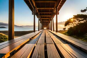 a wooden bridge leads to the ocean at sunset. AI-Generated photo