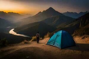 a man stands at the top of a mountain with a tent in the background. AI-Generated photo