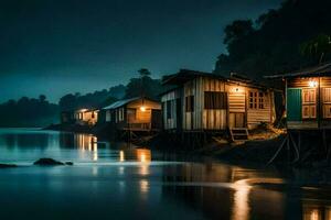 houses on stilts by the water at night. AI-Generated photo