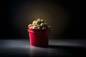 un rojo Cubeta lleno con nueces en un oscuro antecedentes. generado por ai foto