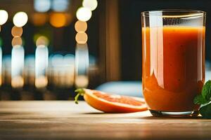 un vaso de naranja jugo con menta hojas en el mesa. generado por ai foto