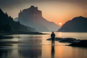 un hombre en pie en el apuntalar de un lago a puesta de sol. generado por ai foto