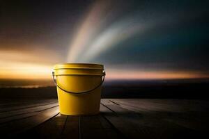 a yellow bucket sitting on a wooden table with a rainbow in the background. AI-Generated photo