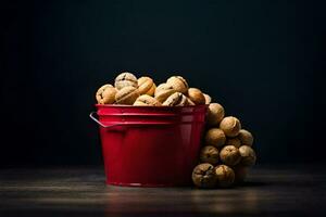 walnuts in a red bucket on a dark background. AI-Generated photo