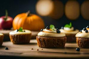 mini cupcakes with cream cheese frosting and blueberries. AI-Generated photo