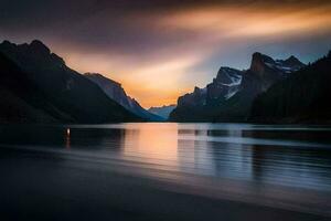 the sun sets over a mountain range and lake. AI-Generated photo