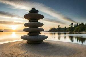 un apilar de piedras en el playa a puesta de sol. generado por ai foto