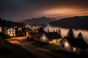 un pequeño pueblo por el agua a noche. generado por ai foto