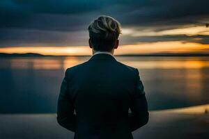 a man in a suit stands in front of a body of water at sunset. AI-Generated photo