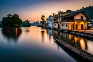 un río en el medio de un pueblo a puesta de sol. generado por ai foto