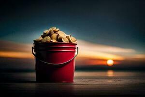 a bucket filled with nuts on the beach at sunset. AI-Generated photo