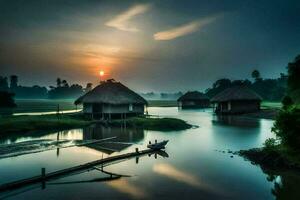 the sun rises over a river and some huts. AI-Generated photo