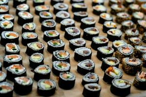 different Kinds of asia seafood sushi on a slate photo