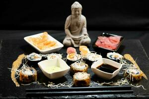 different Kinds of asia seafood sushi on a slate photo