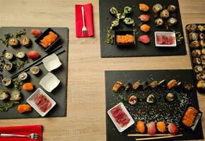 different Kinds of asia seafood sushi on a slate photo