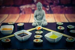 different Kinds of asia seafood sushi on a slate photo