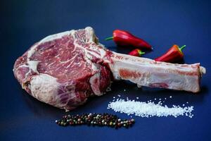 Tomahawk steak with herbs and spices photo